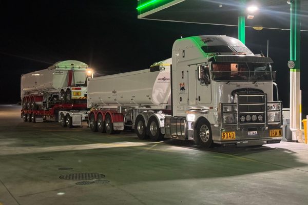 Flexible Backload Freight Solutions – TM Heavy Haulage Flexible backload freight solutions truck at night stop – TM Heavy Haulage